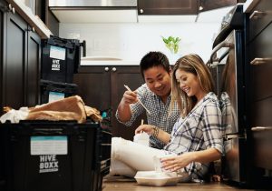 Photo of couple moving home temporary internet