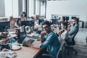photo of people using internet for business in office